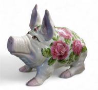 A Wemyss Ware type  pig, decorated with large cabbage rorse, 26cm high