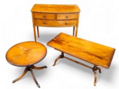 A reproduction hall table; rounded rectangular coffee table;  a circular occasional table;  flamed