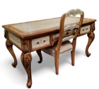 A contemporary French style desk, faux tooled leather inlaid writing surface, three drawers to