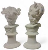 A pair of 20th century busts, in the white, of a boy and a girl, on pedestals, 31cm high,  marked