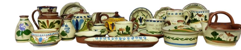 Torquay and Devon Ware - teapots, dishes, jugs, cups and saucers, painted with stylised flower