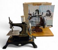 A early 20th century  German tin plate child's sewing machine;  another, Essex (2)