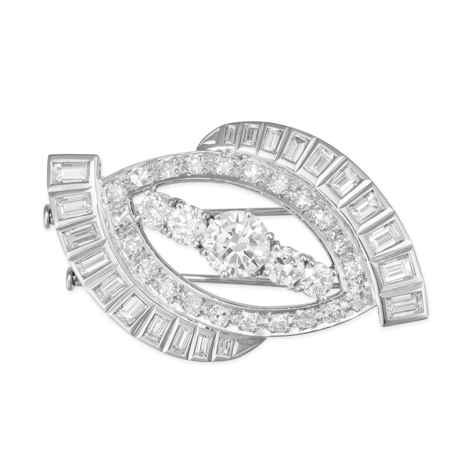 A DIAMOND BROOCH in 18ct white gold, the stylised brooch set to the centre with a round brilliant...