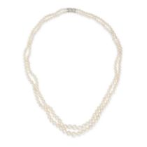 A TWO ROW NATURAL SALTWATER PEARL AND DIAMOND NECKLACE comprising two rows of graduating pearls r...