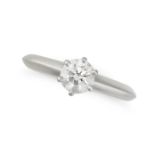 TIFFANY & CO., A DIAMOND ENGAGEMENT RING in platinum, set with a round brilliant cut diamond of 0...