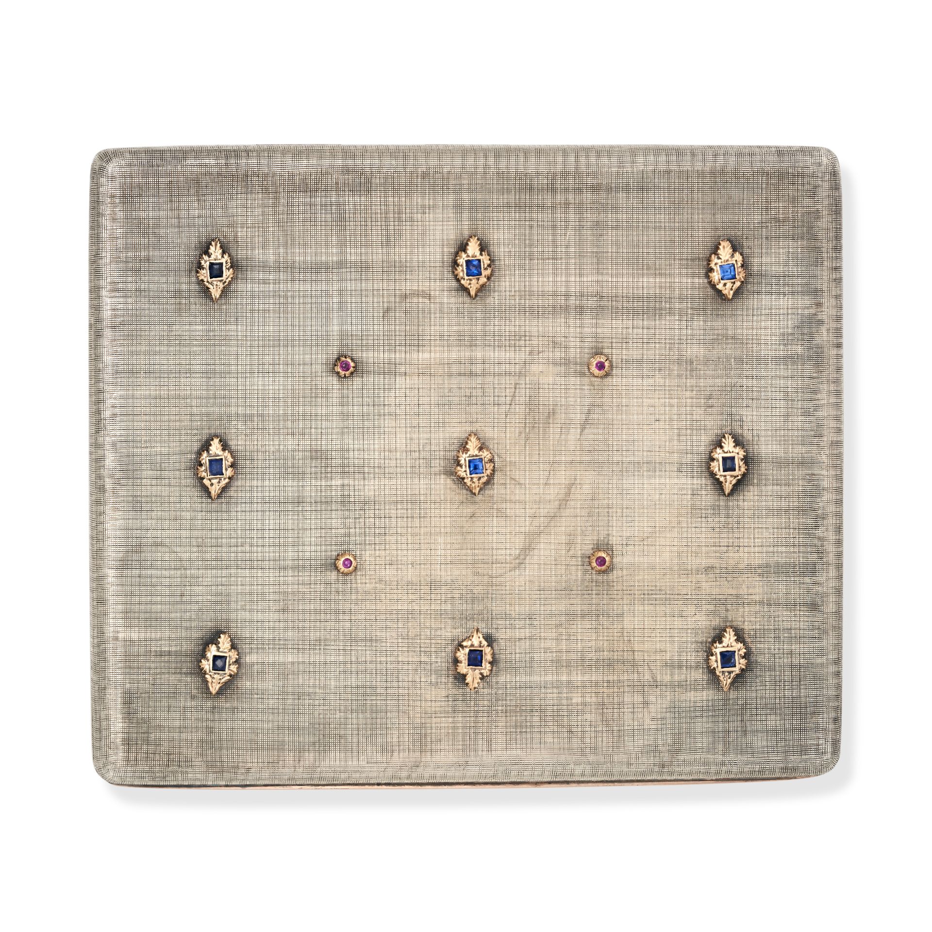 BUCCELLATI, A SAPPHIRE AND RUBY CIGARETTE CASE in silver, the hinged case in trompe l'oeil style,...