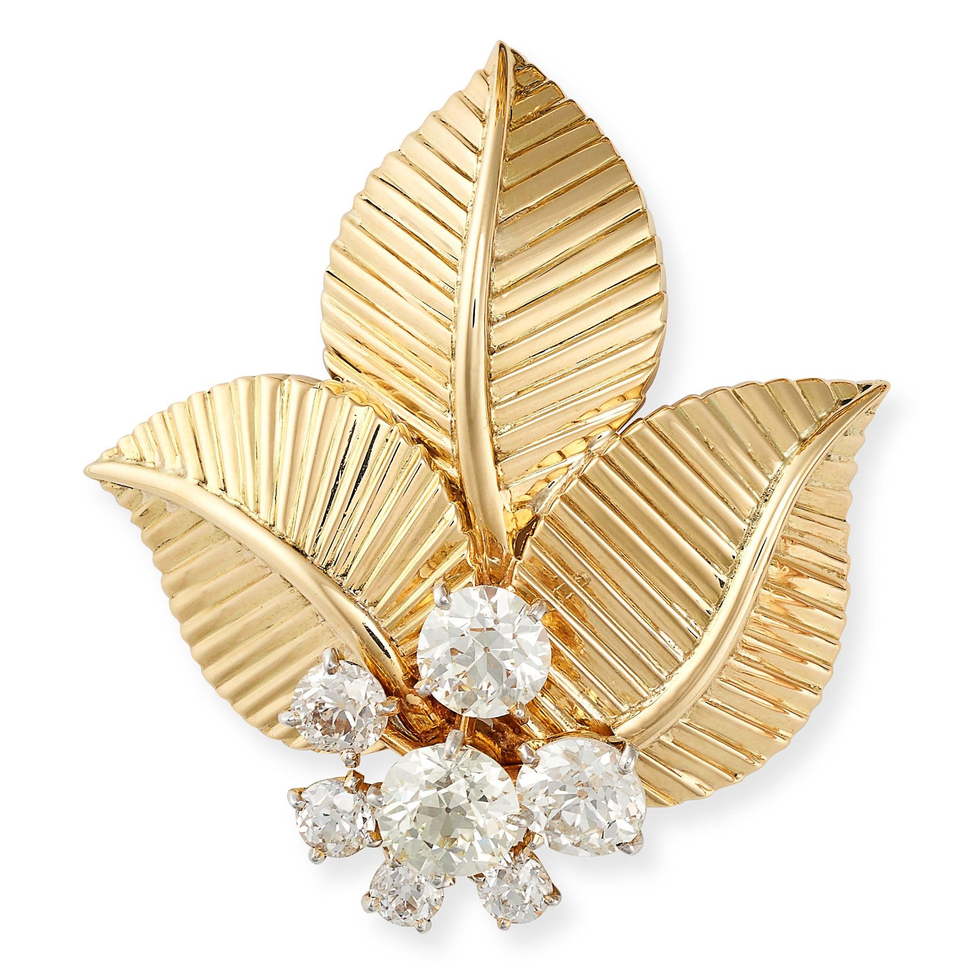 CARTIER, A DIAMOND LEAF BROOCH in 18ct yellow gold, designed as three leaves accented by a cluste...