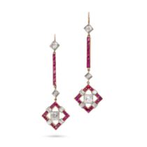 A FINE PAIR OF RUBY AND DIAMOND DROP EARRINGS in yellow gold, each comprising a row of old cut di...