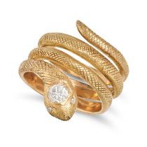 AN ANTIQUE DIAMOND SNAKE RING in yellow gold, designed as an engraved coiled snake, the head set ...