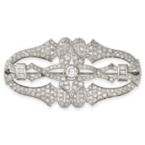 A FINE DIAMOND PLAQUE BROOCH set centrally with an old European cut diamond to an openwork body s...