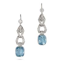 A PAIR OF AQUAMARINE AND DIAMOND DROP EARRINGS each comprising a round brilliant cut diamond susp...