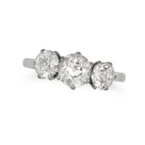 A THREE STONE DIAMOND RING in platinum, set with three old European cut diamonds all totalling 2....