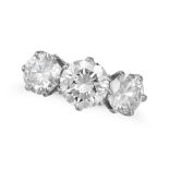 A DIAMOND THREE STONE RING in platinum, set with three round brilliant cut diamonds, the diamonds...