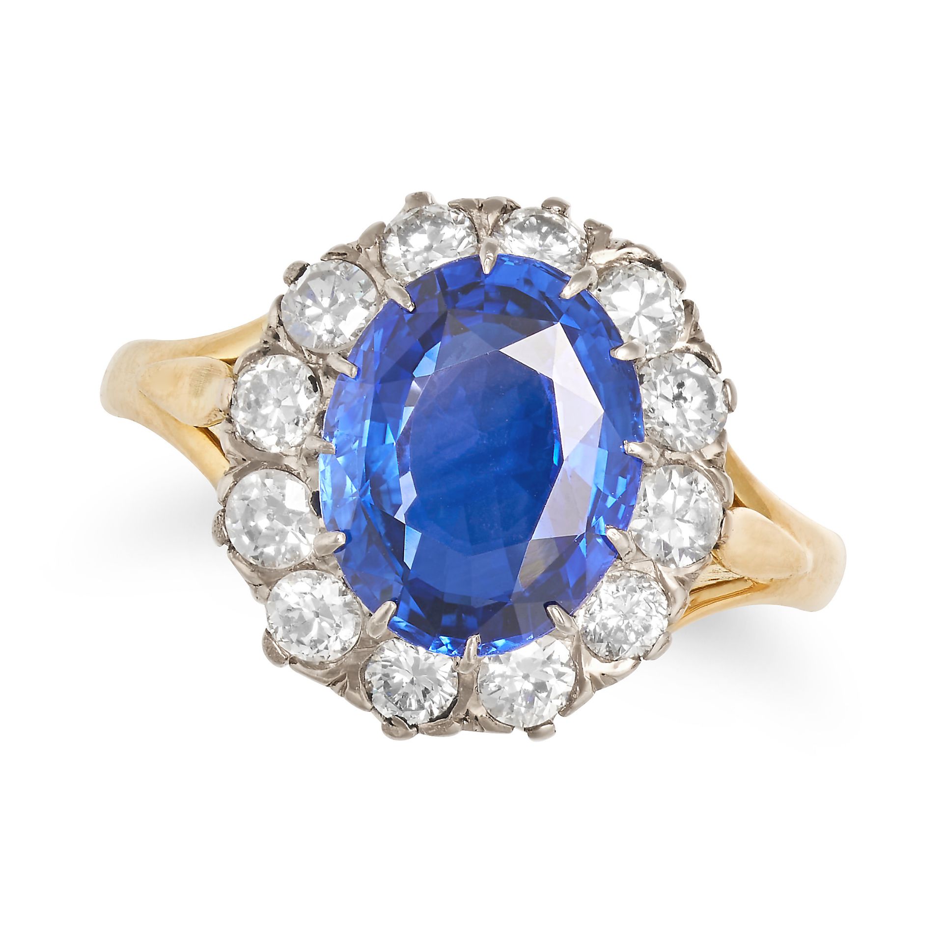 AN UNHEATED SAPPHIRE AND DIAMOND CLUSTER RING in yellow gold, set with an oval cut sapphire of 3.... - Image 2 of 2
