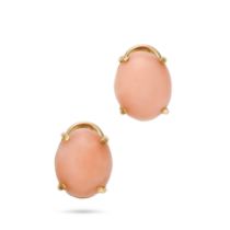 A PAIR OF CORAL STUD EARRINGS in 14ct yellow gold, each set with an oval cabochon coral, screw ba...