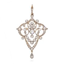 AN ANTIQUE DIAMOND PENDANT in yellow gold and silver, the openwork scrolling pendant set througho...