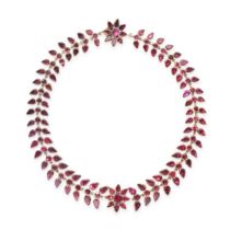 A FINE ANTIQUE GARNET NECKLACE, 19TH CENTURY in yellow gold, comprising a row of round cut garnet...