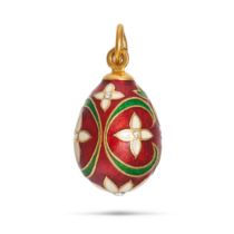 A DIAMOND AND ENAMEL EGG PENDANT in yellow gold, the egg shaped pendant in foliate design relieve...