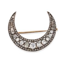 AN ANTIQUE DIAMOND CRESCENT MOON BROOCH, 19TH CENTURY in yellow gold and silver, designed as a cr...