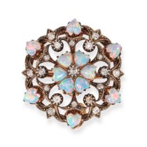 AN OPAL AND DIAMOND BROOCH / PENDANT in yellow gold and silver, the openwork body set with an old...