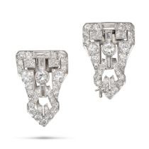 A PAIR OF DIAMOND CLIP BROOCHES in white gold and platinum, the sheild shaped clips set throughou...