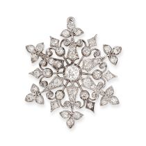 AN ANTIQUE DIAMOND SNOWFLAKE BROOCH / PENDANT later rhodium plated, set to the centre with an old...