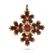 AN ANTIQUE GARNET AND PEARL CROSS BROOCH / PENDANT in yellow gold, set with an oval cut garnet, a...