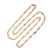A GOLD CHAIN NECKLACE in 15ct yellow gold, comprising a row of fancy gold links, no assay marks, ...