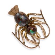 A BOULDER OPAL LOBSTER BROOCH in 9ct yellow gold, set with two cabochon boulder opals, marked DWA...