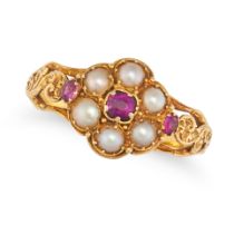 AN ANTIQUE RUBY AND PEARL RING in yellow gold, set with a cushion cut ruby in a cluster of seed p...