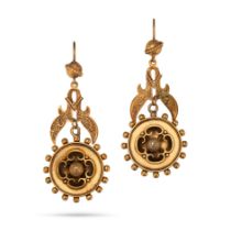 A PAIR OF ANTIQUE GOLD DROP EARRINGS in yellow gold, the scrolling earrings suspending a circular...
