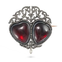 AN ANTIQUE FRENCH GARNET AND DIAMOND SWEETHEART BROOCH / PENDANT in yellow gold and silver, set w...