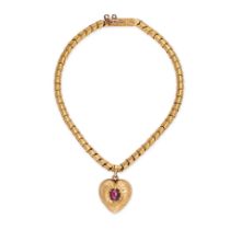 AN ANTIQUE GARNET HEART LOCKET BRACELET in yellow gold, comprising a snake link bracelet, suspend...