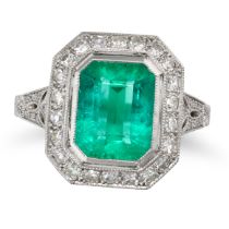 AN EMERALD AND DIAMOND RING in platinum, set with an octagonal step cut emerald of 2.74 carats in...