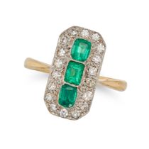 AN EMERALD AND DIAMOND DRESS RING in yellow gold, the octagonal face set with three cushion cut e...