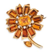 CARTIER, A FINE ART DECO CITRINE AND DIAMOND FLOWER BROOCH, 1937, in yellow gold, designed as a f...