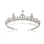 A FINE ANTIQUE FRENCH DIAMOND AND PEARL TIARA in yellow gold and silver, set throughout with old ...
