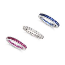 THREE GEMSET FULL ETERNITY RINGS in 18ct white gold, one set all around with a row of round brill...