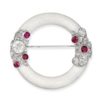 AN ART DECO ROCK CRYSTAL, RUBY AND DIAMOND CIRCLE BROOCH in platinum, comprising an open circle o...