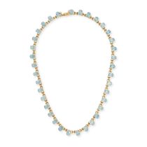 AN AQUAMARINE FRINGE NECKLACE in yellow gold, set with a row of oval cut aquamarines, the aquamar...