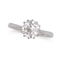 A SOLITAIRE DIAMOND RING in platinum, set with an old European cut diamond of 1.26 carats, inscri...