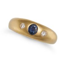 A SAPPHIRE AND DIAMOND GYPSY RING in yellow gold, set with an oval cut sapphire accented by two r...