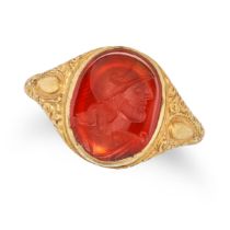 AN ANTIQUE CARNELIAN INTAGLIO LOCKET RING in 18ct yellow gold, set with a carnelian intaglio carv...