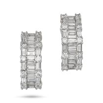 A PAIR OF DIAMOND HALF HOOP EARRINGS in 18ct white gold, each set with a row of baguette cut diam...