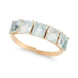 AN AQUAMARINE BANGLE in yellow gold, the open cuff hinged bangle set with five octagonal step cut...