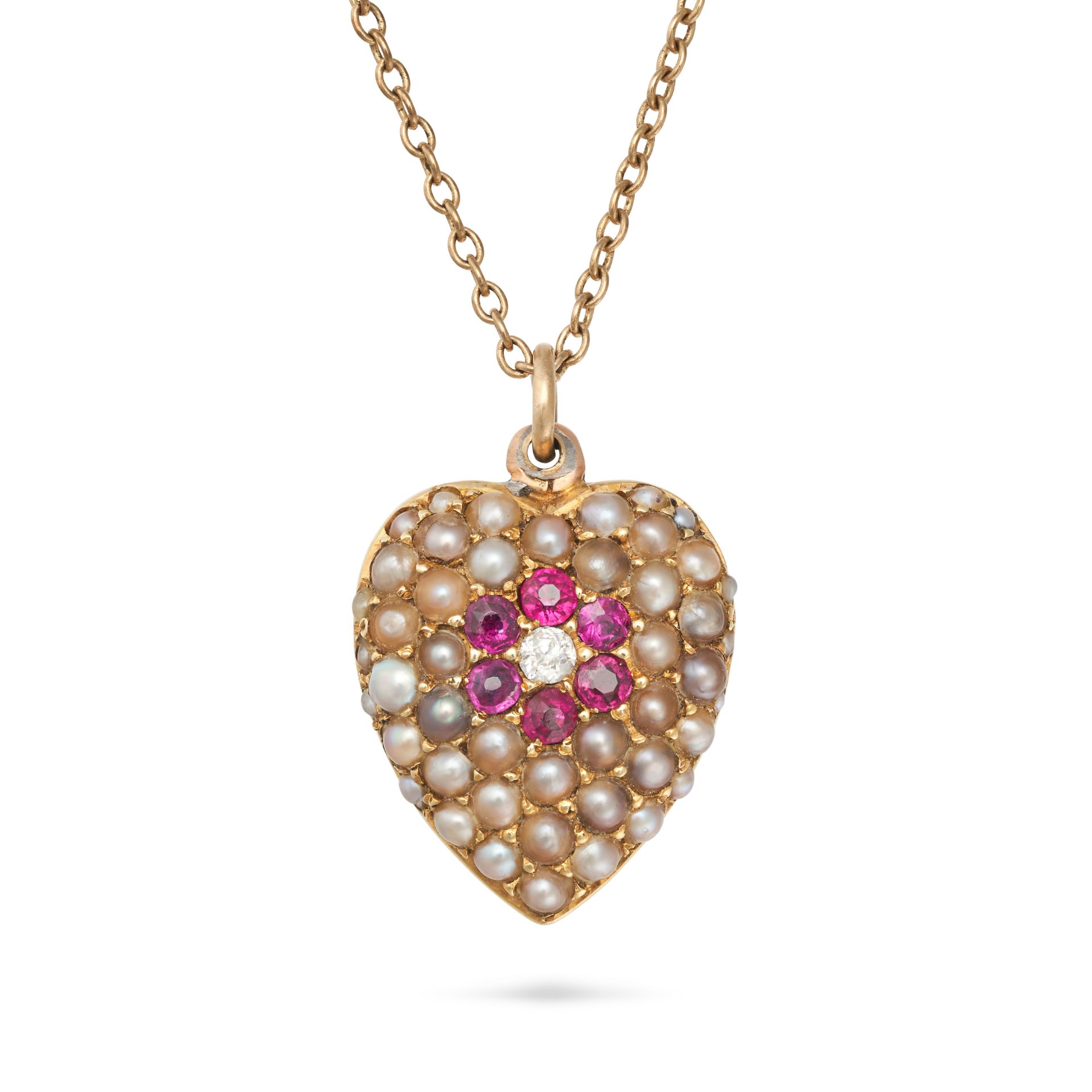 AN ANTIQUE PEARL, RUBY AND DIAMOND HEART PENDANT NECKLACE in yellow gold, the pendant set with an...