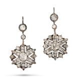 A FINE PAIR OF ANTIQUE DIAMOND STAR DROP EARRINGS in silver, each comprising a row of old cut dia...