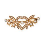 AN ANTIQUE PEARL HEART BROOCH in yellow gold, designed as a witches heart flanked by lily of the ...