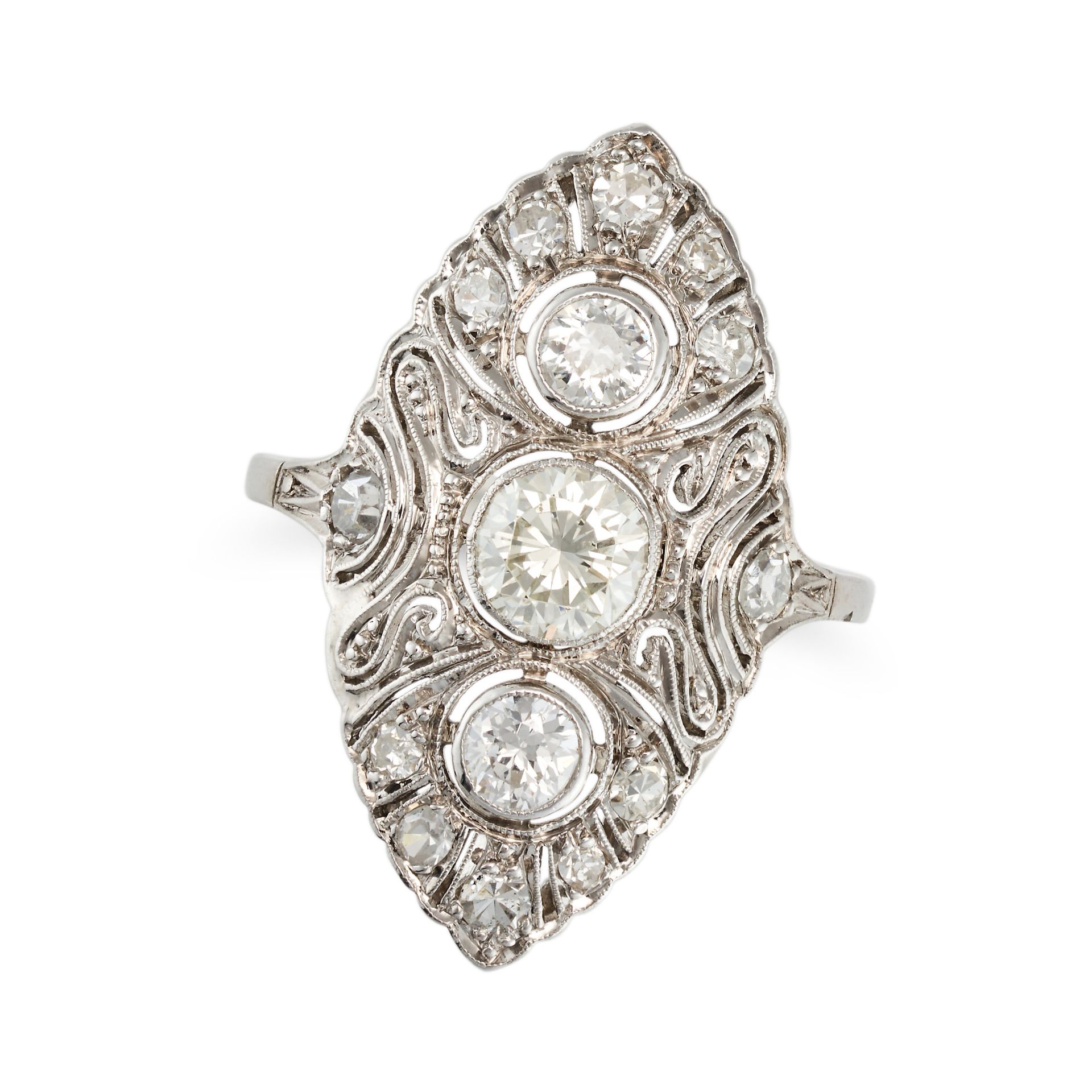 A DIAMOND NAVETTE RING in white gold, the pierced navette face set with three principal round cut...