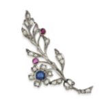 AN ANTIQUE DIAMOND, RUBY AND SAPPHIRE SPRAY BROOCH set with a round cut sapphire of approximately...